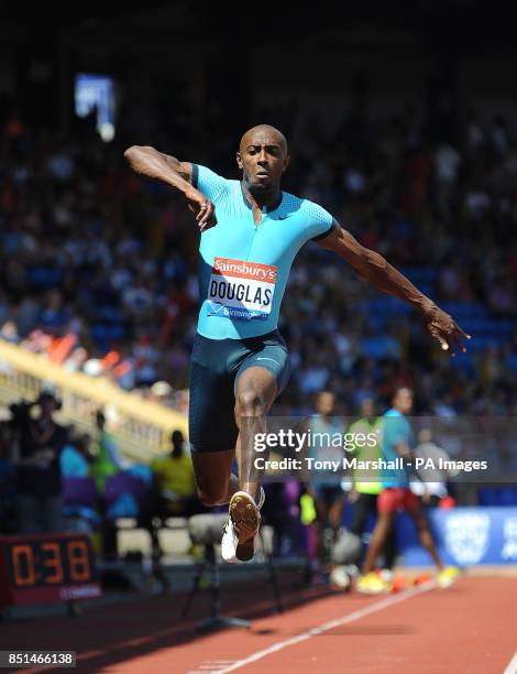 Great Britain's Nathan Douglas in action in the triple jump competition during day two of the Birmingham Diamond League athletics meeting at the...