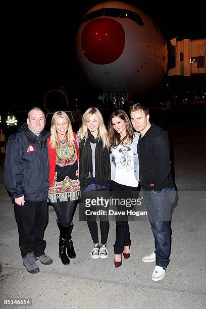 Chris Moyles, Denise Van Outen, Fearne Cotton, Cheryl Cole and Gary Barlow pose before boarding a flight to Tanzania to climb Mount Kilimanjaro in...