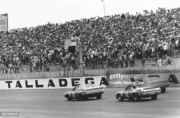 Buddy Baker wound up second to Dick Brooks in the Talladega 500. Bobby Allison and Richard Petty trail on August 12, 1973 at the Talladega Speedway...