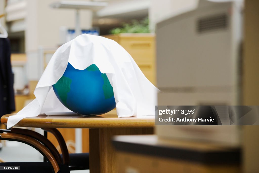 Globe on desk in office