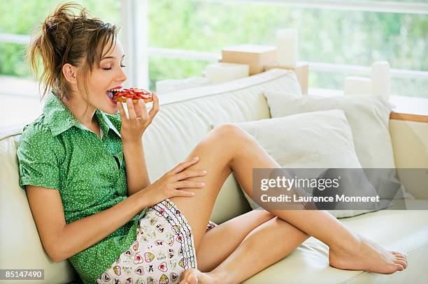 slender woman eyes closed eating a strawberry pie - girl of desire stock pictures, royalty-free photos & images