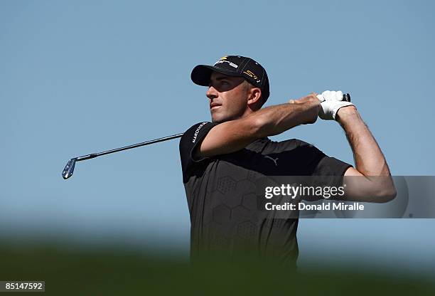 Geoff Ogilvy of Australia tees off the 3rd hole during the third round of the Accenture Match Play Championships at the Ritz-Carlton Golf Club at...