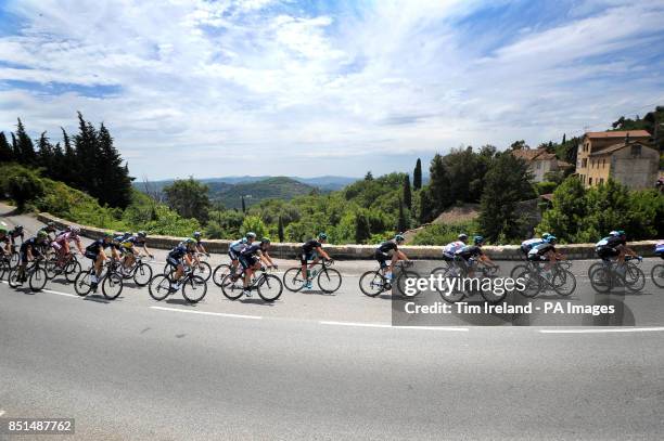 Chris Froome and Team Sky with Mark Cavendish descend out of Grasse during Stage Five of the 2013 Tour de France between Cagnes-sur-Mer and Marseille.