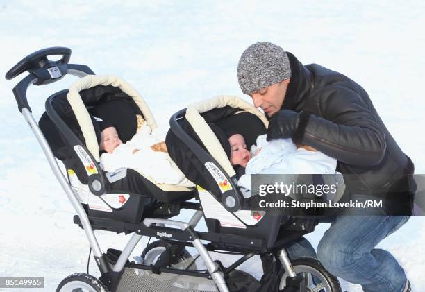 Singer Ricky Martin and his sons Matteo Martin and Valentino Martin go for a walk on January 21, 2009 in New York City.