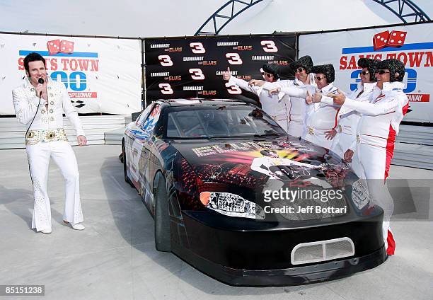 Elvis impersonators pose during practice for the NASCAR Sprint Cup Series Shelby 427 at the Las Vegas Motor Speedway on February 27, 2009 in Las...