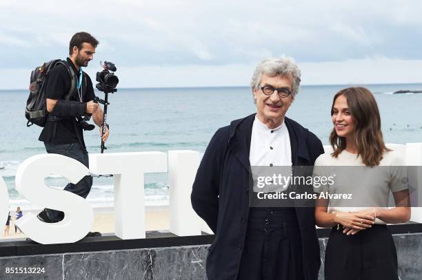 Director Wim Wenders and actress Alicia Vikander attend 'Submergence' photocall during the 65th San Sebastian International Film Festival on...