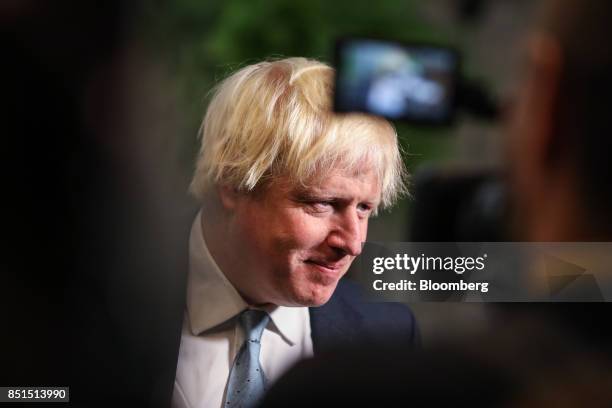 Boris Johnson, U.K. Foreign secretary, speaks to members of the media following a speech by U.K. Prime Minister Theresa May at Complesso Santa Maria...