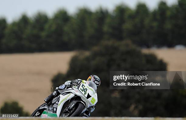 Kenan Sofuoglu of Turkey and the Hanspree Ten Kate Honda Team takes a corner during the World Super Sport practice session for round one of the...