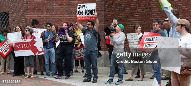 People protest the appearance of U.S. Attorney General Jeff Sessions at the Moakley Federal Courthouse in Boston on Sep. 21, 2017.