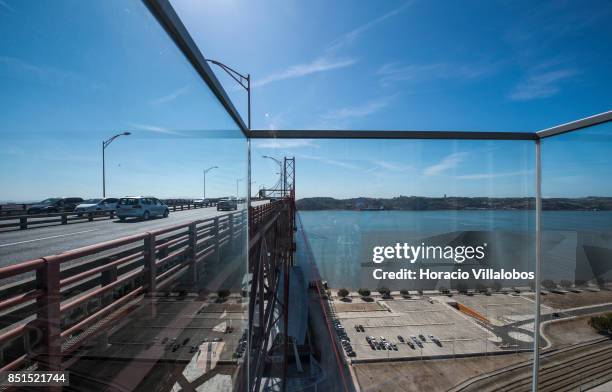 View of the bridge and Tagus River from the viewpoint, at 80 meters over street level, of Pier 7 of 25 de Abril bridge, site of the "Experiencia...