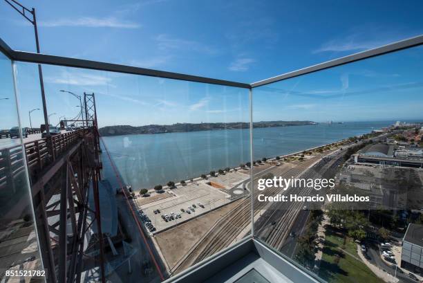 View of the bridge and Tagus River from the viewpoint, at 80 meters over street level, of Pier 7 of 25 de Abril bridge, site of the "Experiencia...