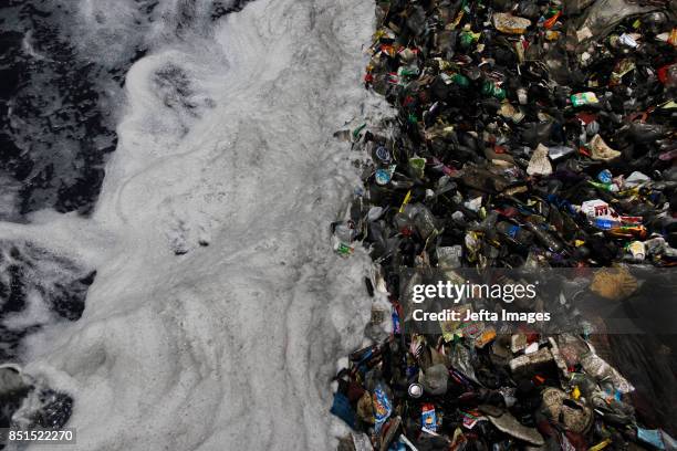 Citarum River Flood in Jompong Waterfall area filled with garbage and exposed to B3 waste in Bandung, West Java, on September 22, 2017. According to...