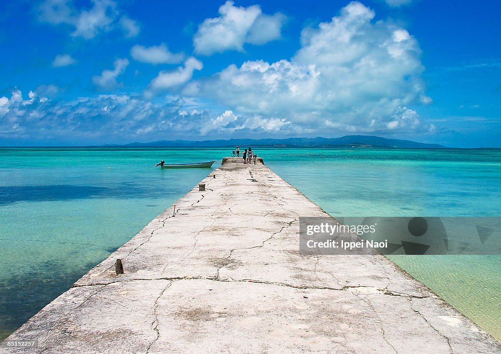 Jetty over the crystal clear blue waters