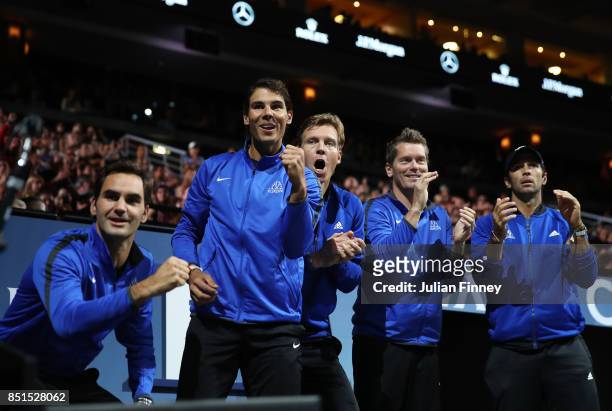 Roger Federer, Rafael Nadal, Tomas Berdych, Thomas Enqvist and Fernando Verdasco of Team Europe celebrate as they watch the singles match between...