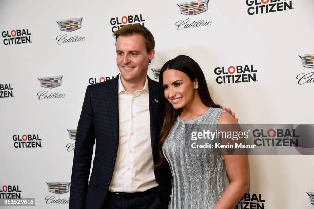 Co-Founder and CEO of Global Citizen and Global Poverty Project Hugh Evans and Demi Lovato attend Global Citizen & Cadillac in Concert - The...