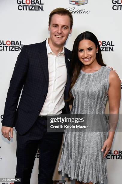 Co-Founder and CEO of Global Citizen and Global Poverty Project Hugh Evans and Demi Lovato attend Global Citizen & Cadillac in Concert - The...