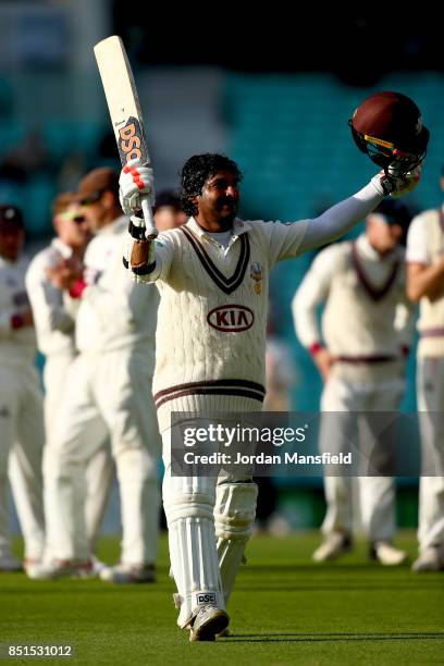 Kumar Sangakkara of Surrey acknowledges the crowd as he makes his way off in his final home game for Surrey after being caught and bowled by Dominic...