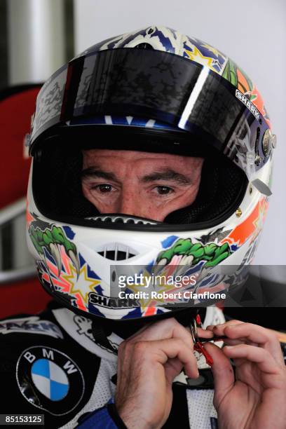 Troy Corser of Australia and BMW Motorrad Motorsport prepares for the practice session for round one of the Superbike World Championship at the...