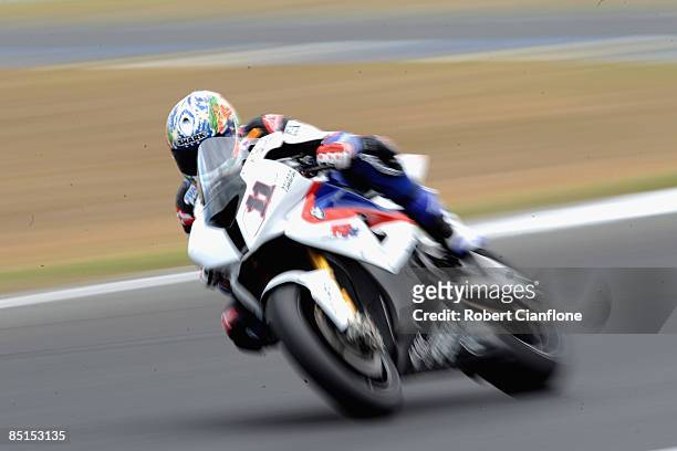 Troy Corser of Australia and BMW Motorrad Motorsport takes a corner during the practice session for round one of the Superbike World Championship at...