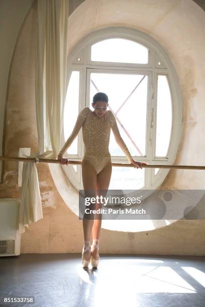 Ballet dancer Hannah O'Neill wearing Olivier Rousteing designed costume is photographed for Paris Match on May 29, 2017 in Paris, France.
