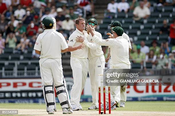 Australian bowler Peter Siddle celebrates on February 28, 2009 after taking the wicket of South African batsman Neil Mckenzie during the third day of...