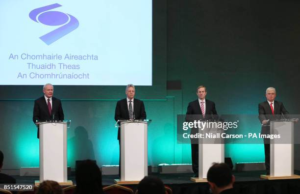 Deputy First Minister Martin McGuinness, First Minister Peter Robinson, Taoiseach Enda Kenny and Tanaiste Eamon Gilmore speaking at a press...