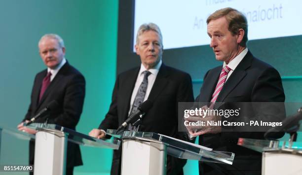 Deputy First Minister Martin McGuinness, First Minister Peter Robinson and Taoiseach Enda Kenny speaking at a press conference after the North South...