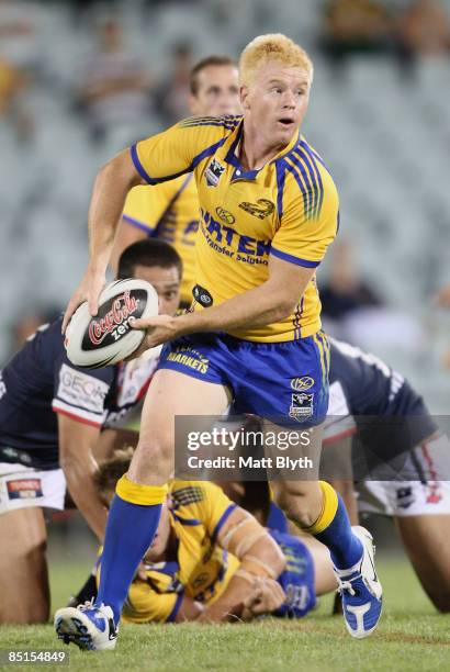 Kris Keating of the Eels offloads the ball during the NRL Trial match between the Parramatta Eels and the Sydney Roosters at Campbelltown Sports...