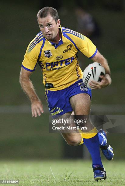 Luke Burt of the Eels runs the ball during the NRL Trial match between the Parramatta Eels and the Sydney Roosters at Campbelltown Sports Stadium on...