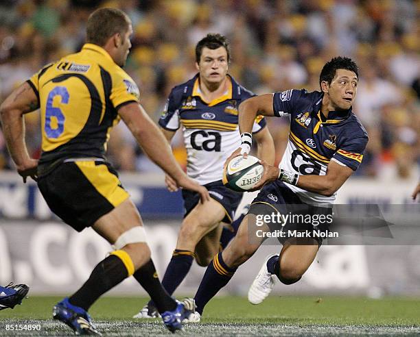 Christian Lealiifano of the Brumbies looks to pass during the round three Super 14 match between the Brumbies and the Western Force at Canberra...