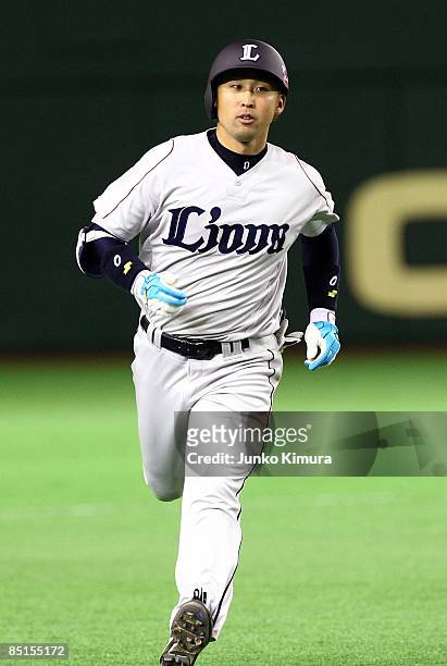 Outfielder Yutaro Ohsaki of Saitama Seibu Lions runs on his way to scoring after hitting a two run home run in the top half of the second inning...