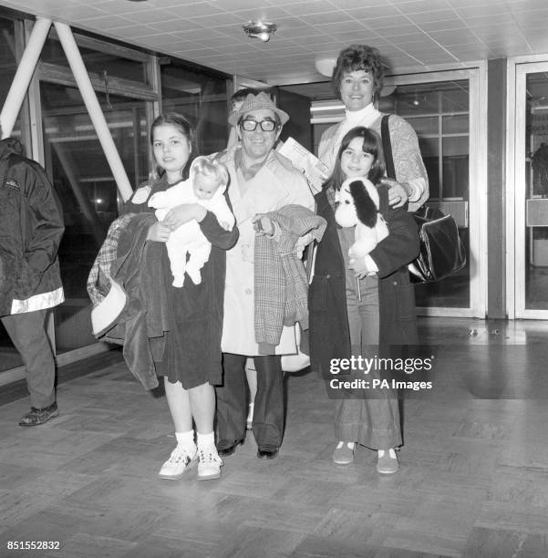 Ronnie Corbett at Heathrow Airport with his wife Anne and daughters Emma and Sophie, 10.