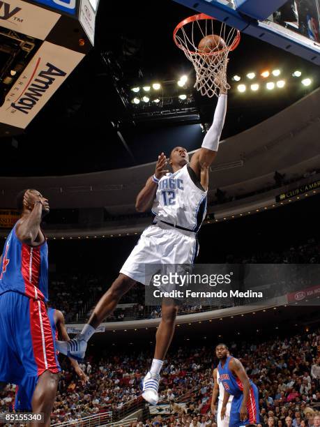 Dwight Howard of the Orlando Magic shoots against the Detroit Pistons during the game on February 27, 2009 at Amway Arena in Orlando, Florida. NOTE...