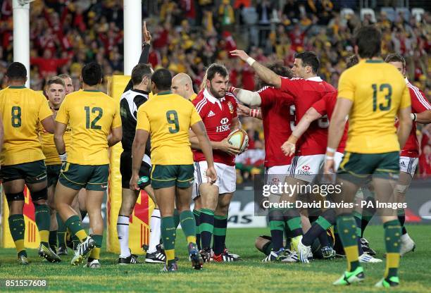 British and Irish Lions' Alex Corbisiero is congratulated on scoring their first try of the game