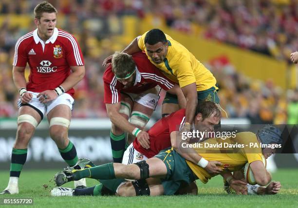 Australia captain James Horwill is tacked by British and Irish Lions captain Alun-Wyn Jones