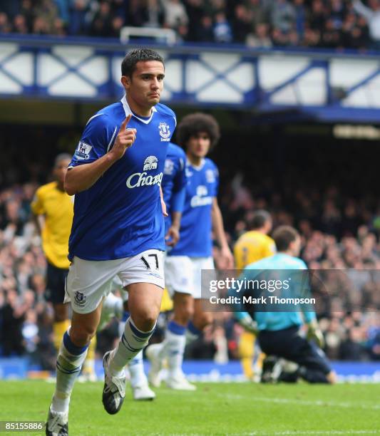 Tim Cahill of Everton celebrates his goal during the Barclays Premier League match between Everton and West Bromwich Albion at Goodison Park on...