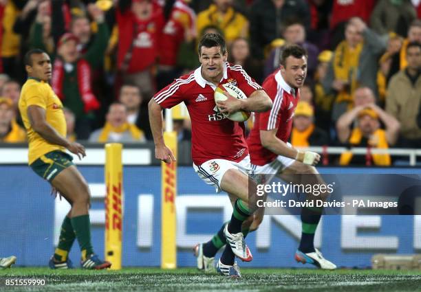 British and Irish Lions' Jonathan Sexton runs in to score their second try of the game