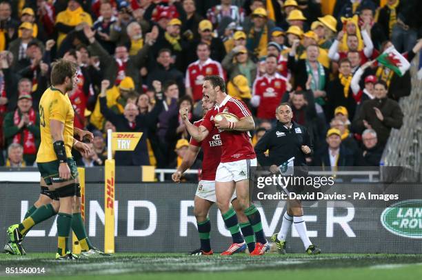 British and Irish Lions' George North celebrates scoring their third try of the game