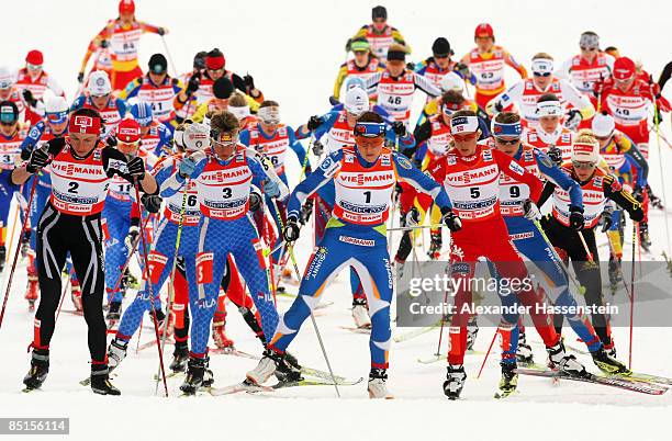 Justyna Kowalczyk of Poland, Marianna Longa of Italy, Aino Kaisa Saarineen of Finland and Kristin Stoermer Steira of Norway head the field out of the...