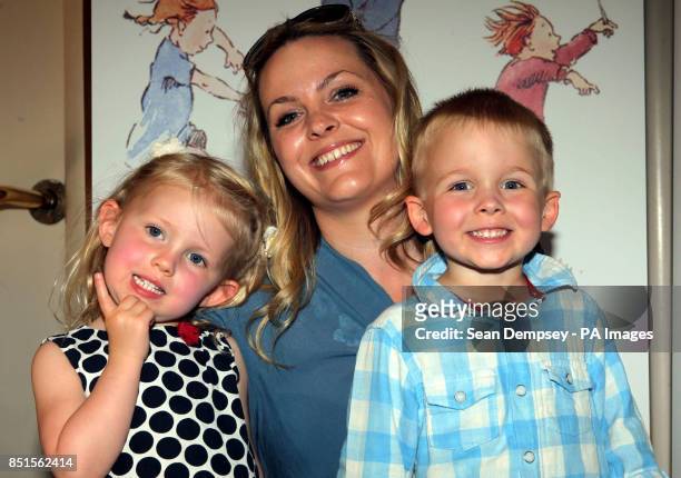 Jo Joyner and twins Edie Fred , aged three-and-a-half attending a special performance show of We're Going On A Bear Hunt at the Lyric Theatre.