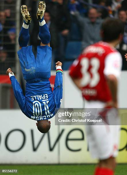 Joel Epalle of Bochum celebrates his first goal and Mario Cvitanovic of Cottbus looks dejected during the Bundesliga match between VfL Bochum and FC...