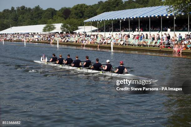 City Of Cambridge boat club do a row past to mark their 150th anniversary during day four of the Royal Henley Regatta, Henley on Thames.