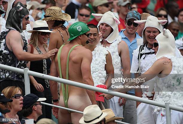 Spectator dressed as a South African version of movie character Borat entertains the crowd during day three of the First Test between South Africa...
