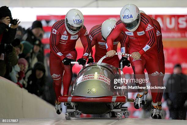 Canada 2, piloted by Lyndon Rush, takes off from the start of the course during first run of the Bobsled competition during the FIBT Bobsled World...