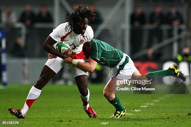 Luke Fitzgerald of Ireland tackles Paul Sackey of England during the RBS Six Nations match between Ireland and England at Croke Park on February 28,...