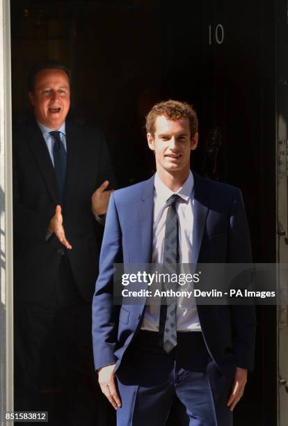 Prime Minister David Cameron greets Wimbledon winner Andy Murray outside 10 Downing Street before attending a cross-party reception in the garden,...