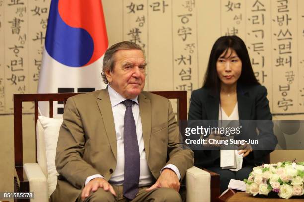 Gerhard Schroeder and South Korean National Assembly Speaker Chung Sye-kyun attend a meeting at the National Assembly on September 11, 2017 in Seoul,...