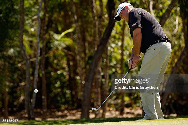 Jarrod Lyle chips onto the green at the 3rd hole during the third round of the Mayakoba Golf Classic on February 28, 2009 at El Camaleon Golf Club in...