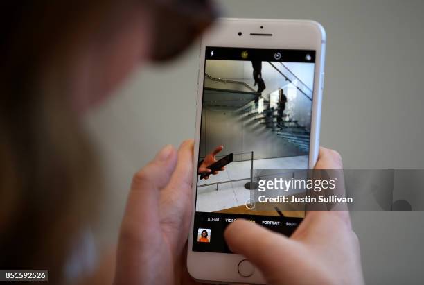 Customer inspects the new Apple iPhone 8 at an Apple Store on September 22, 2017 in San Francisco, California. The new Apple iPhone 8 and 8 Plus, as...