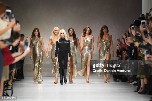 Carla Bruni, Claudia Schiffer, Donatella Versace, Naomi Campbell, Cindy Crawford and Helena Christensen walk the runway at the Versace show during...